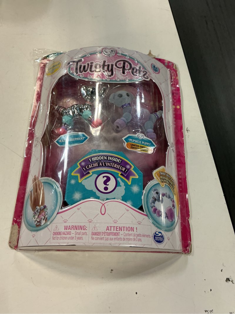 Condition photo showing New/Like New for Twisty Petz – 3-Pack – Razzle Elephant, Cakepup Puppy and Surprise Collectible Bracelet Set for Kids