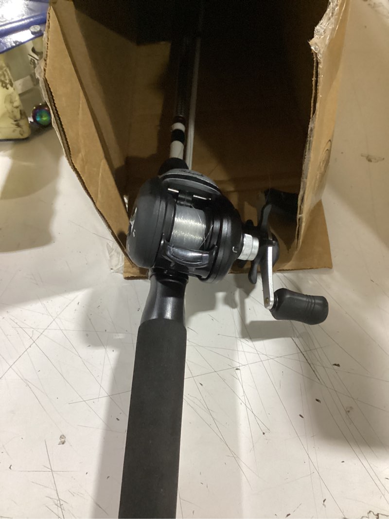 Condition photo showing Good Condition for shakespeare alpha medium 6' low profile fishing rod and bait cast reel combo (2 piece),black, white