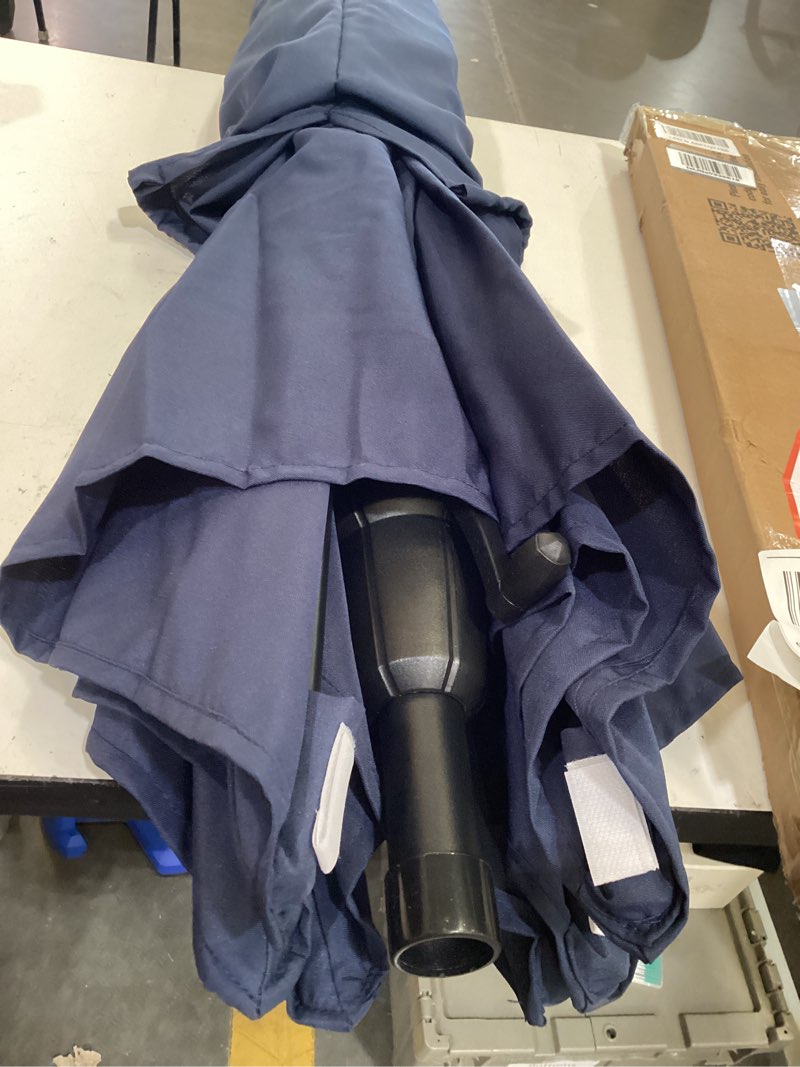 Condition photo showing As Is for royal blue patio umbrella