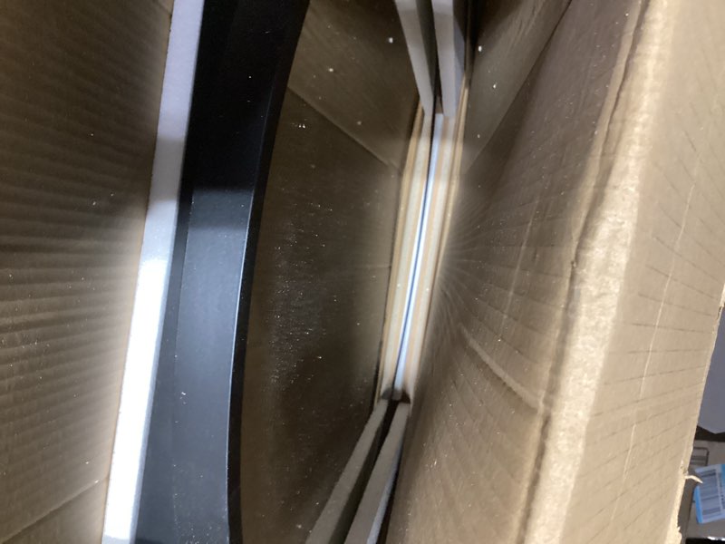 Condition photo showing As Is for Movo 24 x 34 Inch Oval Medicine Cabinet with Mirror,Black Framed Bathroom Mirror Medicine Cabinet Wall Mounted or Recessed Medicine Cabinets for Bathroom with Storage and 2 Removable Shelves