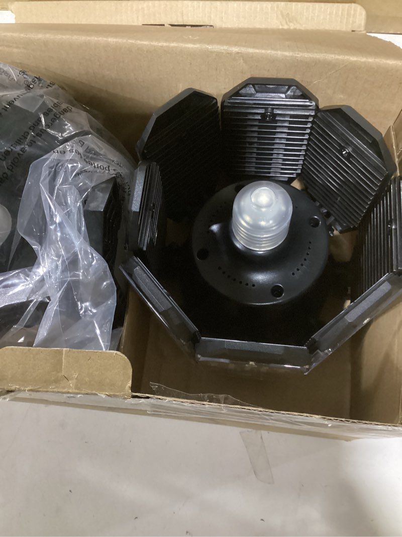 Condition photo showing New/Like New for tanbaby 2 pack garage light warm 150w led garage lights 3000k garage lighting 12000lm [equivalent] deformable garage light ceiling with 6 panels e26/e27 base illuminator 360 basement lights for shop garage light warm 150w-2 pack