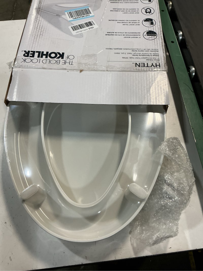 Condition photo showing New/Like New for kohler 25875-0 hyten 3" height, elevated soft close elongated toilet seat, contoured seat with grip-tight bumpers, quick-attach hardware, no slam toilet seat, white white elongated