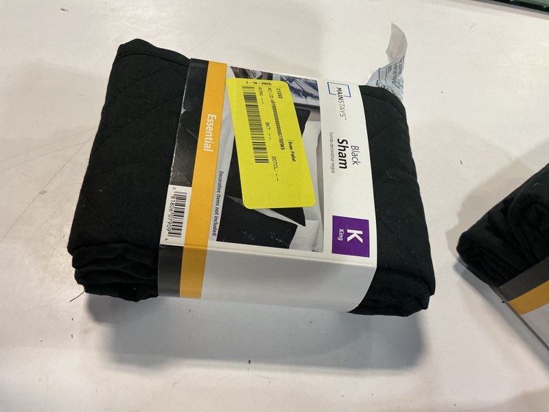 Condition photo showing As Is for mainstays plaid pillow sham  king  black & white  1 pack