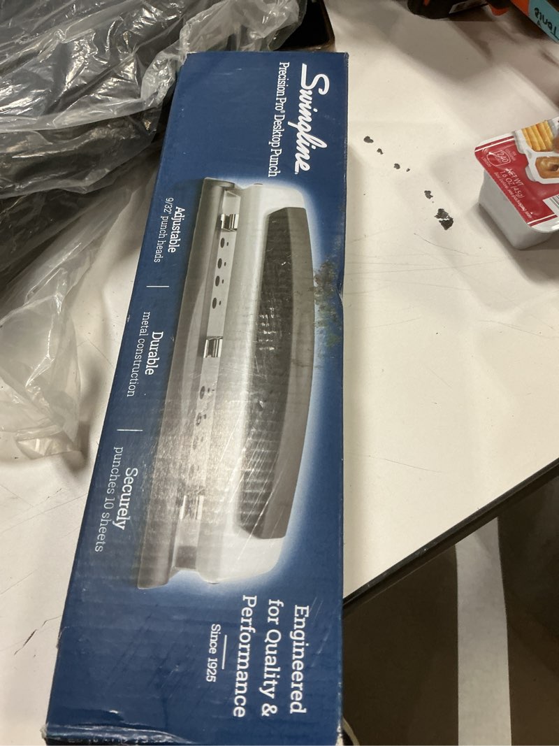 Condition photo showing New/Like New for Swingline 3 Hole Punch, 10 Sheet Capacity Three Hole Puncher 3 Ring, Adjustable 2-3 Hole Paper Punch, Precision Pro, Black & Silver (74037) Black/Silver Regular Size, Pack of 1