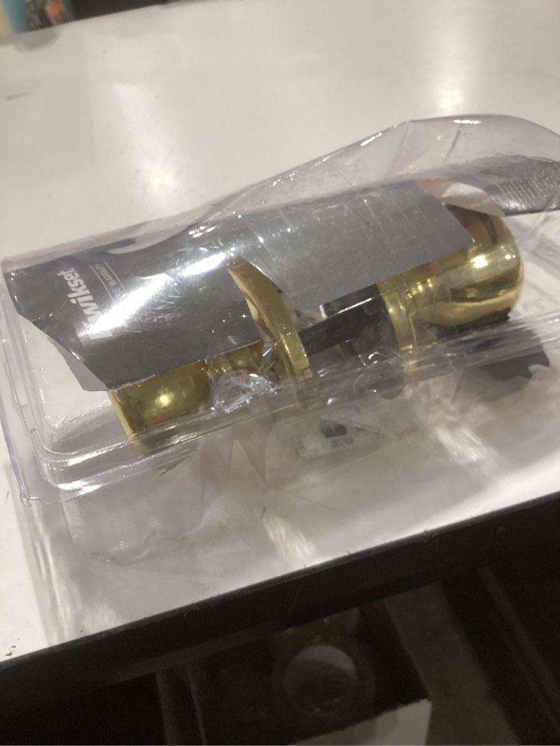 Condition photo showing As Is for mobile home polished brass hall/closet door knob with microban antimicrobial technology