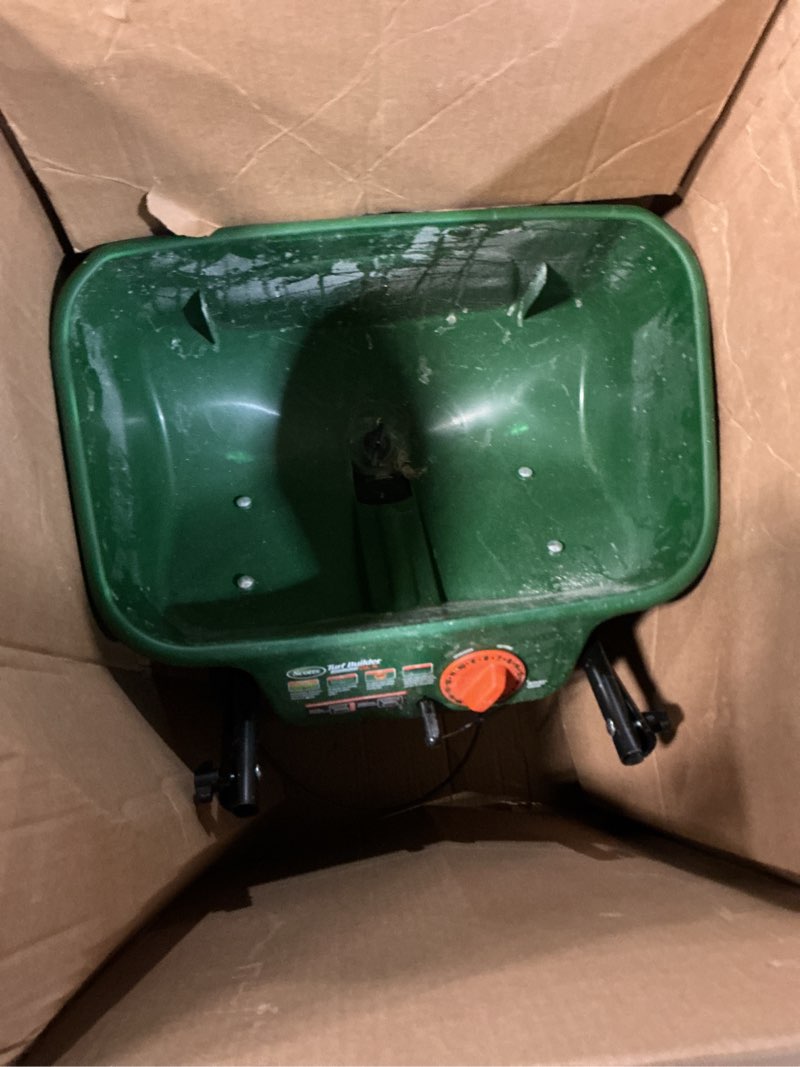 Condition photo showing As Is for scotts turf builder edgeguard dlx broadcast spreader - spreader for lawn fertilizer, weed & insect control, grass seed, and ice melt, holds up to 15,000 sq. ft. of product