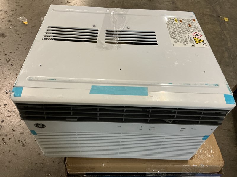 Condition photo showing As Is for 8,000 btu smart window air conditioner for 350 sq. ft. in white with wi-fi and remote