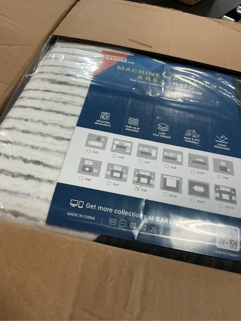 Condition photo showing New/Like New for GarveeHome 6x9 Modern Checkered Area Rug, Geometric Farmhouse Washable Rugs for Living Room Bedroom, Soft Low Pile Non Slip Diamond Floor Mat Plaid Print Throw Rug Indoor Carpet Kids Room Classroom Black/White 6' x 9' (Rectangular)