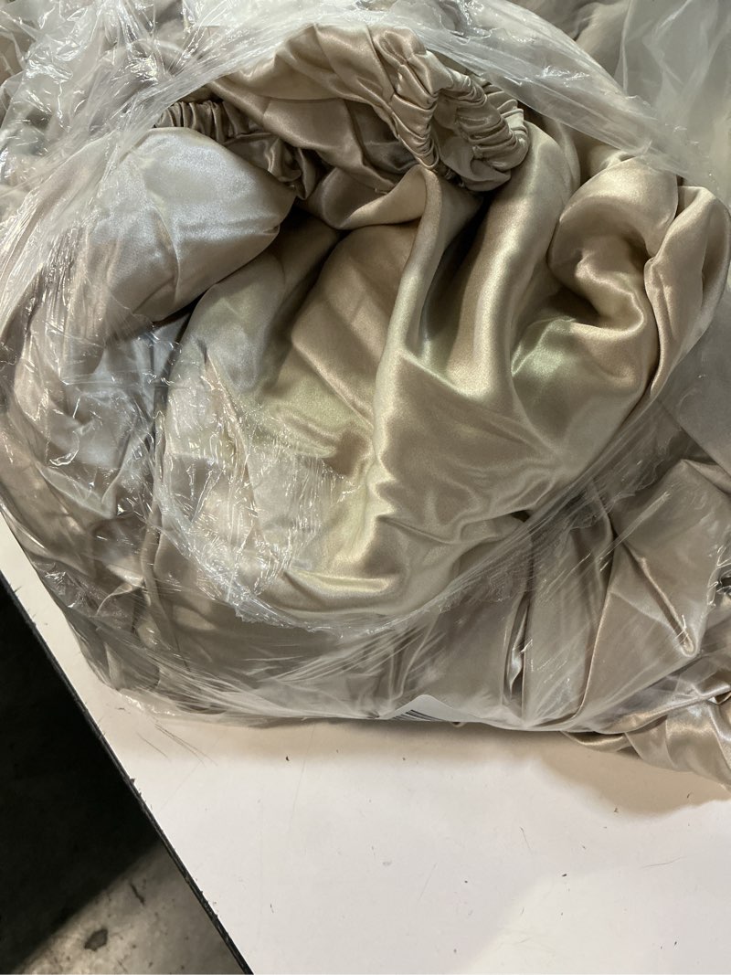 Condition photo showing As Is for mulberry silk sheet set color: champagne(incomplete)(unknown size)