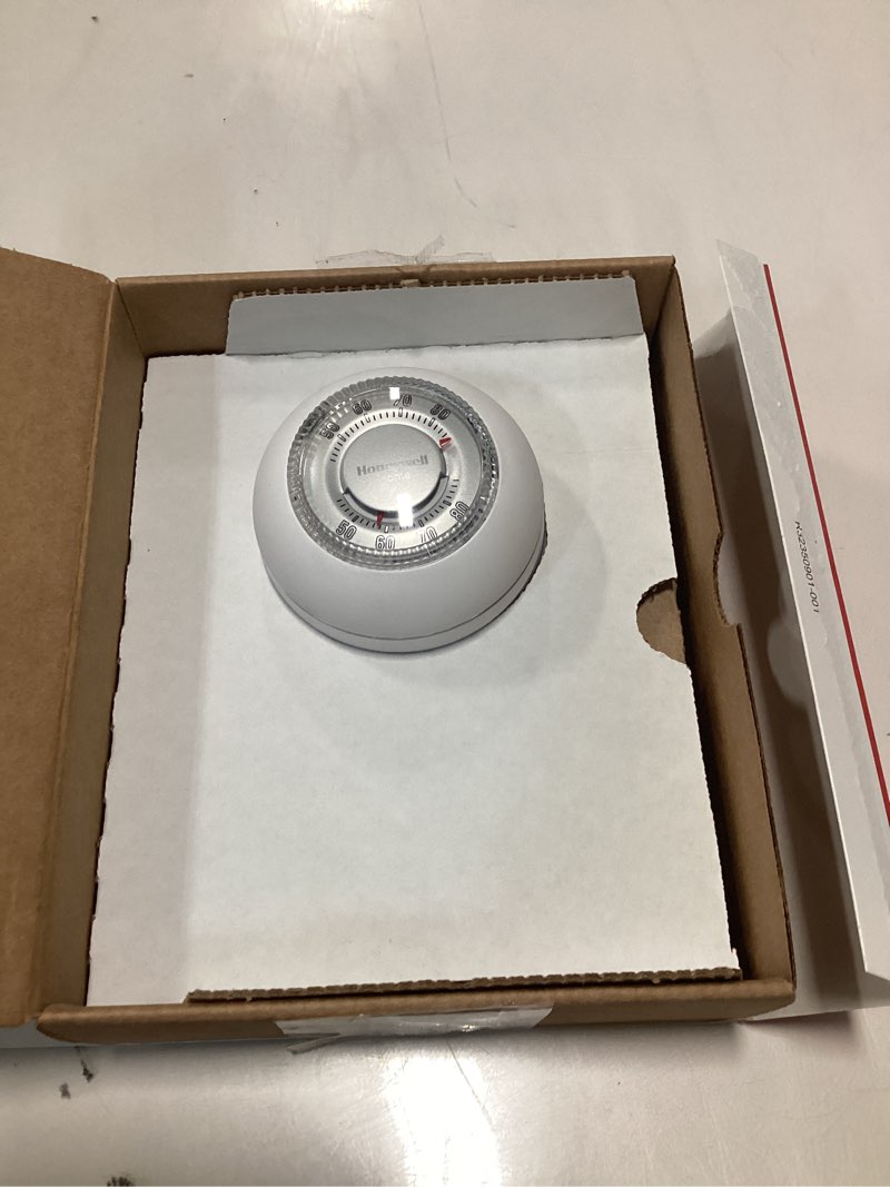 Condition photo showing As Is for Honeywell Home CT87K1004 The Round Heat Only Manual Thermostat,Large,White,Large Thermostat Round