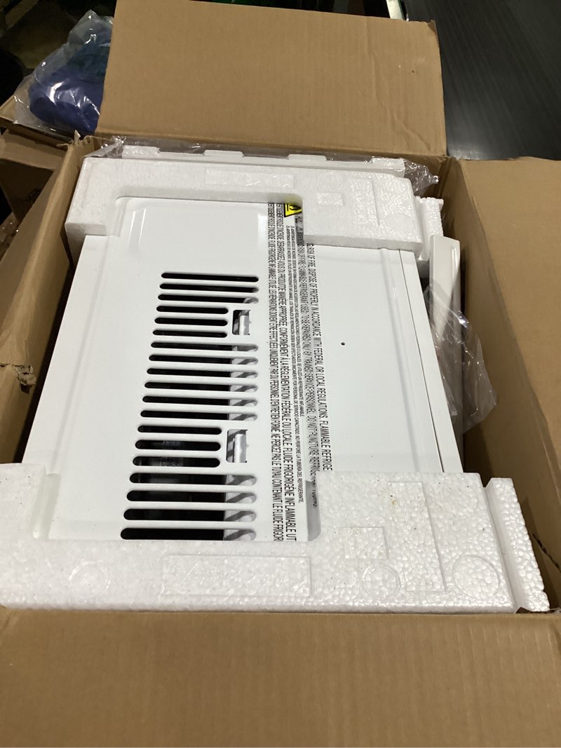 Condition photo showing Good Condition for 6,000 btu 115-volt window air conditioner for 250 sq. ft. rooms with remote in white