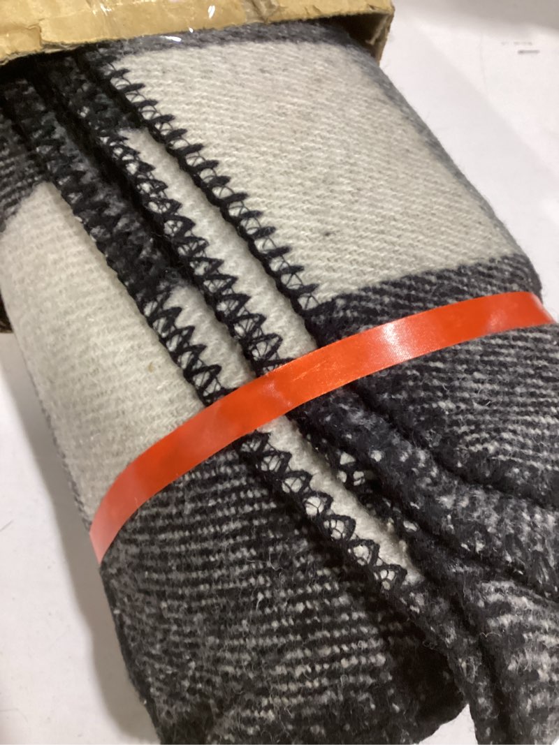 Condition photo showing Good Condition for similar woolly mammoth merino wool blanket- thick, outdoor/indoor throw for campfire, picnic, beach, van life, home, heavy duty insulating sleep plaid, twin size bed, black/cream design black & cream