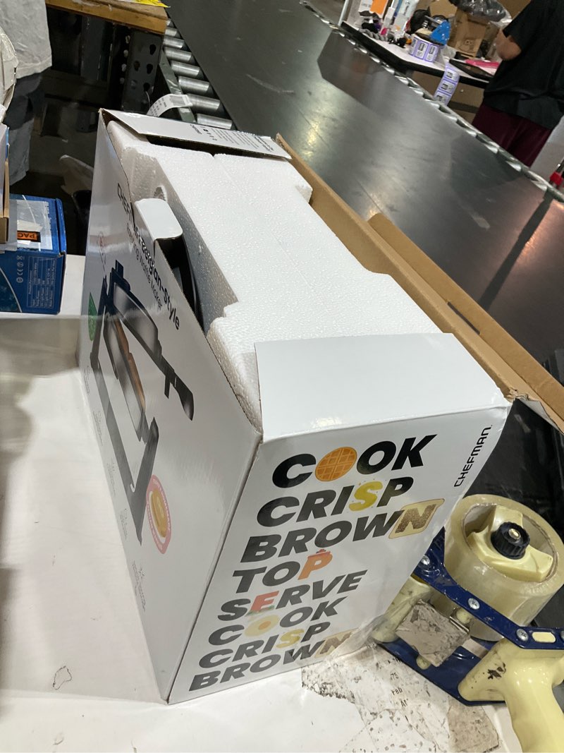 Condition photo showing As Is for chefman rotating belgian waffle maker, 180° flip iron w/ non-stick plates, adjustable timer, locking lid, & drip plate, space saving storage, mess-free breakfast, stainless steel/black