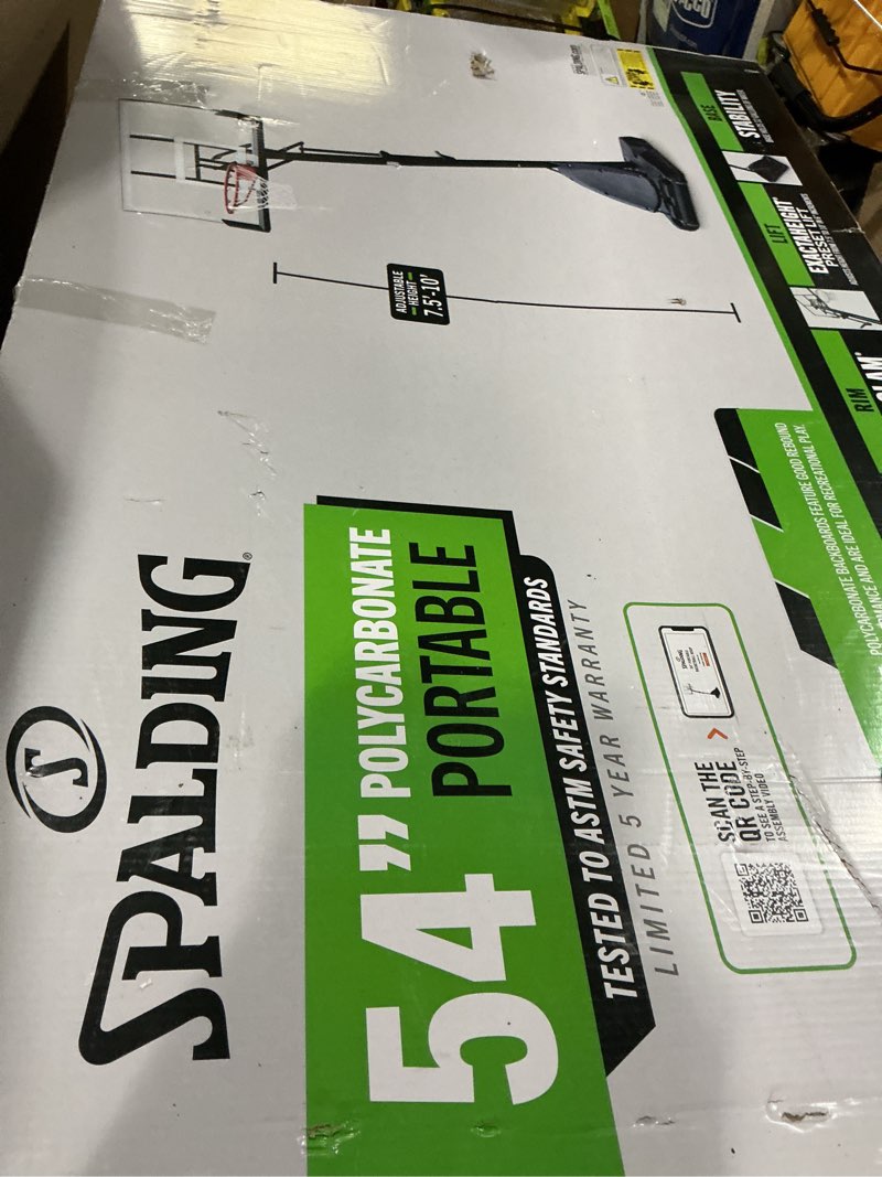 Condition photo showing New/Like New for spalding 54 in. shatter-proof polycarbonate exacta height® portable basketball hoop system