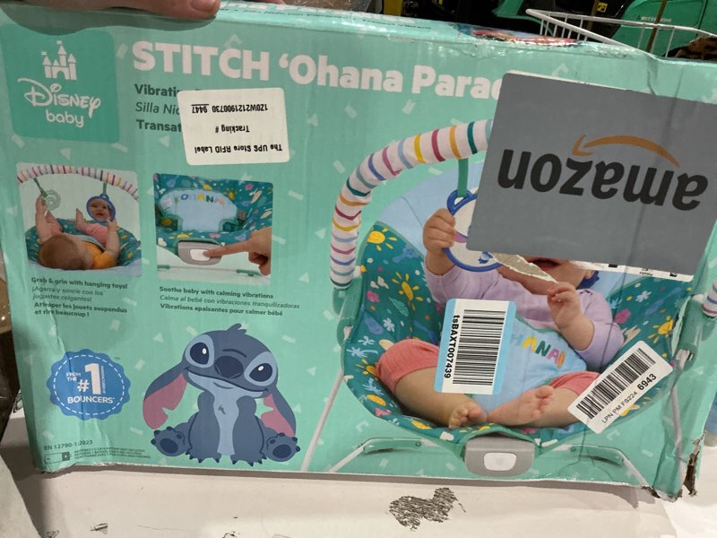 Condition photo showing New/Like New for bright starts disney stitch ohana paradise vibrating baby bouncer, soothing vibrations infant seat with 2 sensory toys, 0-6 months