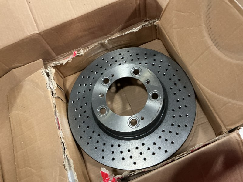 Condition photo showing As Is for brembo 09.8890.21 uv coated vented drilled rear brake rotor porsche oe# 98635240301