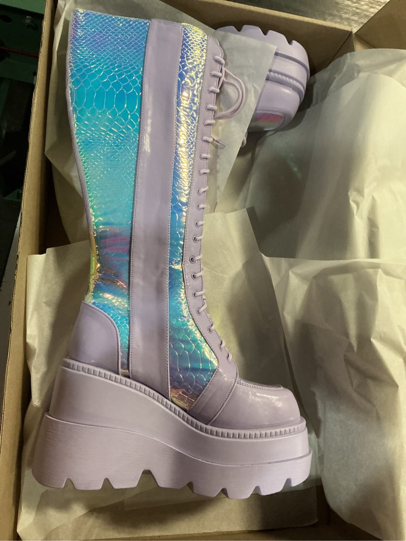 Condition photo showing New/Like New for lavender venom women's knee high platform boots, size 9