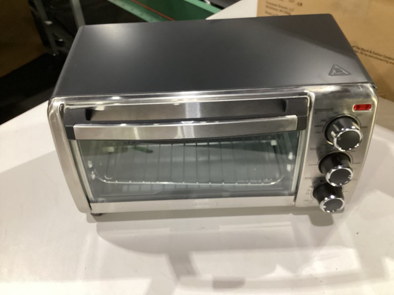 Condition photo showing Good Condition for BLACK+DECKER 4-Slice Convection Oven, Stainless Steel, Curved Interior Fits a 9 inch Pizza, TO1313SBD