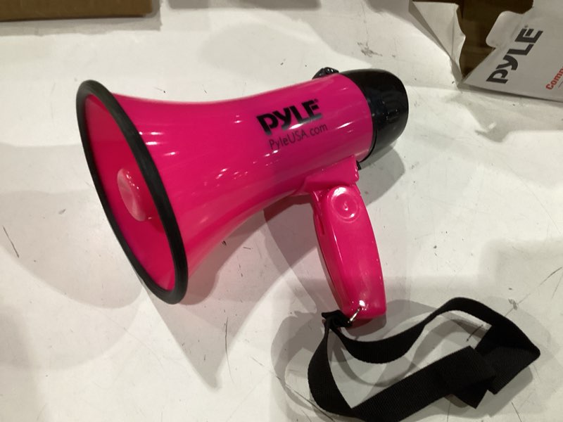 Condition photo showing New/Like New for pyle-pro portable megaphone speaker siren bullhorn - compact and battery operated with 20 watt power, microphone, 2 modes, pa sound and foldable handle for cheerleading and police use pmp24pk (pink)