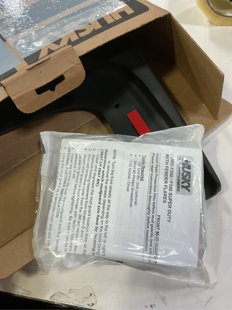 Condition photo showing Good Condition for Husky Liners - Front Mud Guards | 2017-2022 Ford F-250/F-350 Super Duty w/OEM Fender Flares, Front Set - Black, 2 Pc | 58471 WITH Fender Flares (not Tremor) Custom Front Mud Guards