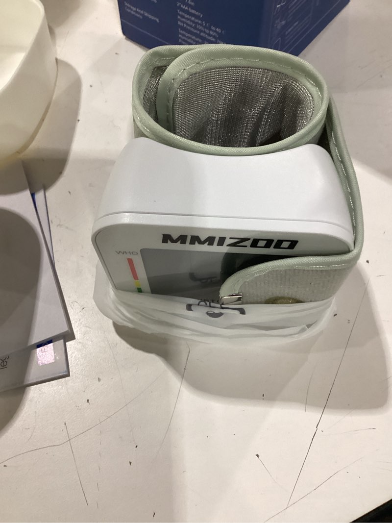 Condition photo showing Good Condition for mmizoo wrist blood pressure monitor large lcd display bp machine adjustable cuff 5.31-7.68 inch automatic 99x2 sets memory with carrying case for home use (w1681)
