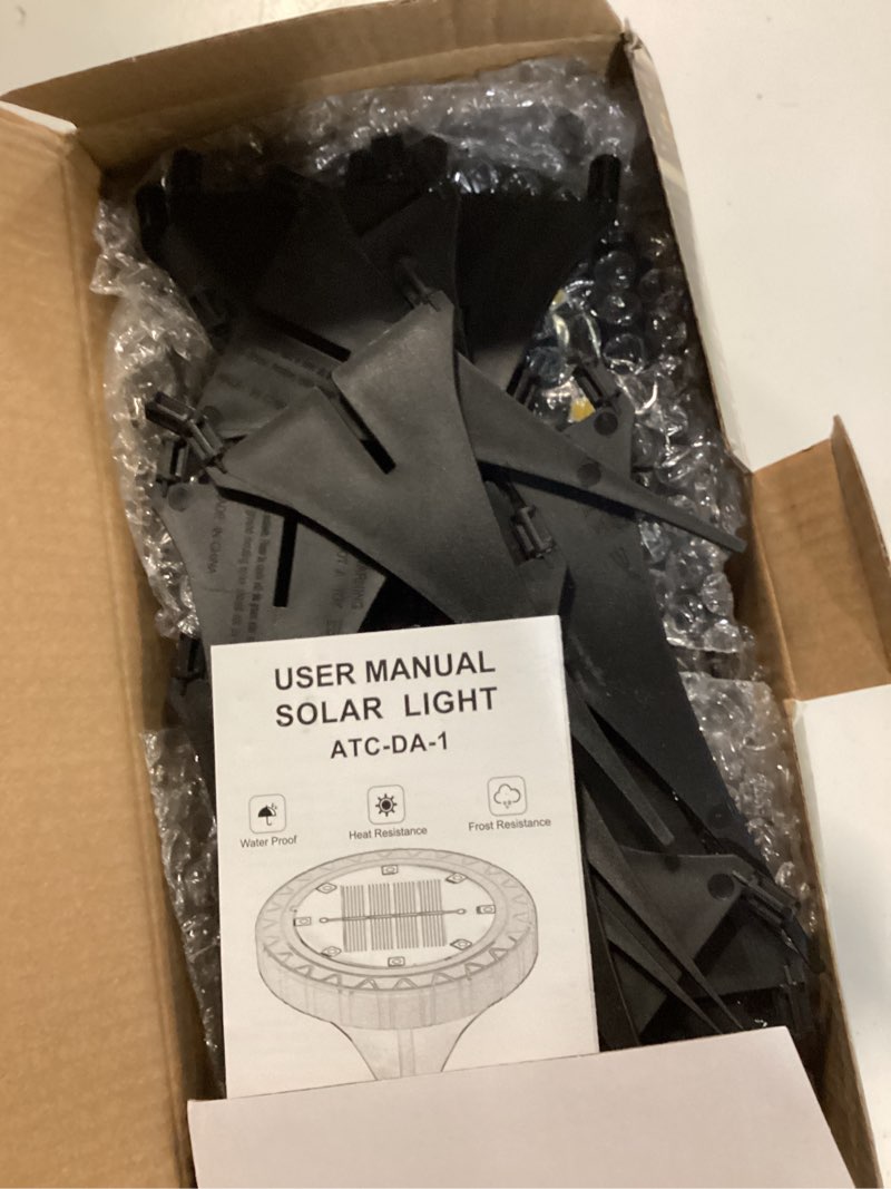 Condition photo showing Good Condition for solar powered 8 pack outdoor led disk lights - ip68 waterproof, non-slip, wear-resistant pathway lights (warm white) black 8 pack