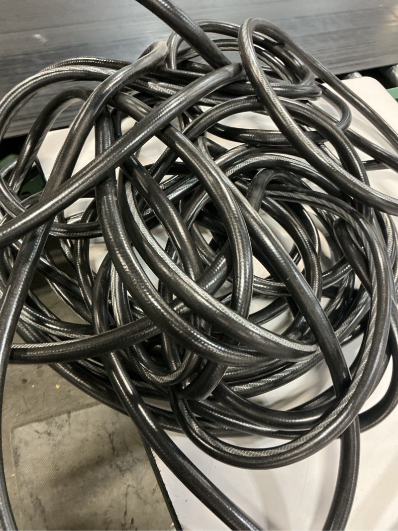 Condition photo showing As Is for neverkink teknor apex 5/8-in x 50-ft heavy -duty kink free vinyl gray coiled hose