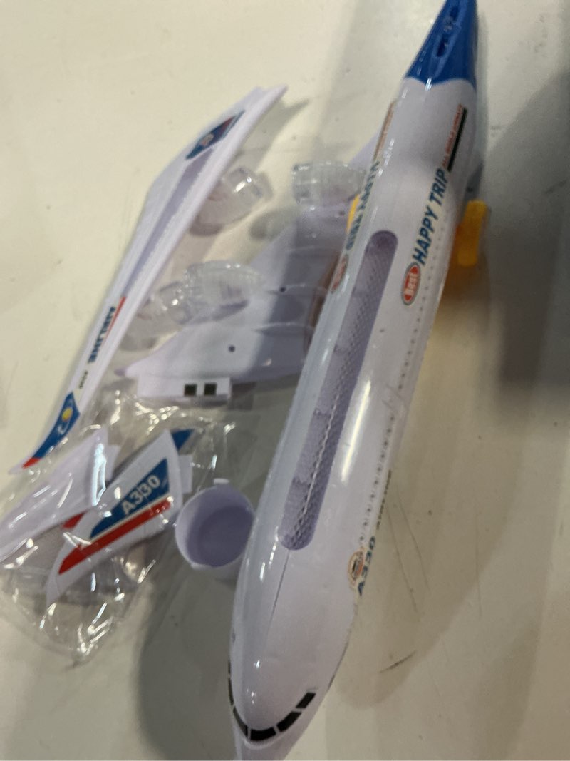Condition photo showing New/Like New for airline toy airplane with music and led lights
