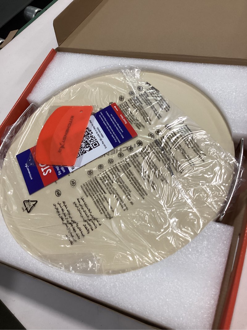 Condition photo showing New/Like New for KitchenStar 16-inch Pizza Stone for Oven and BBQ Grill with Handles, Round, 5/8" Thick - Natural Cordierite, 1800 °F Resistant, Baking Stone Set with Stainless Steel Rack & Plastic Scraper Tool 16 inch