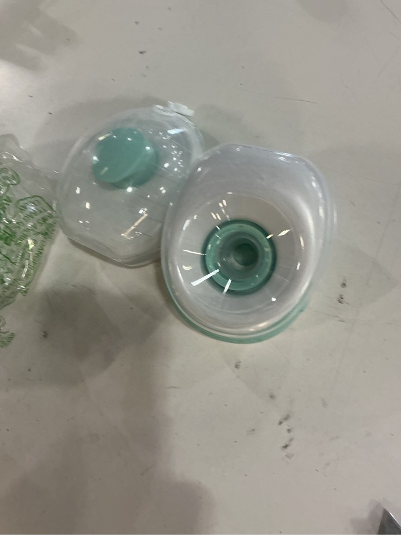 Condition photo showing As Is for willow go - portable breastfeeding extractor and teal case - hands-free breast pump