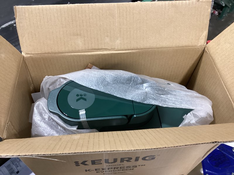 Condition photo showing As Is for Keurig K-Express Single Serve K-Cup Pod Coffee Maker, 3 Brew Sizes, Strong Button Feature, 42oz Removable Reservoir, Evergreen