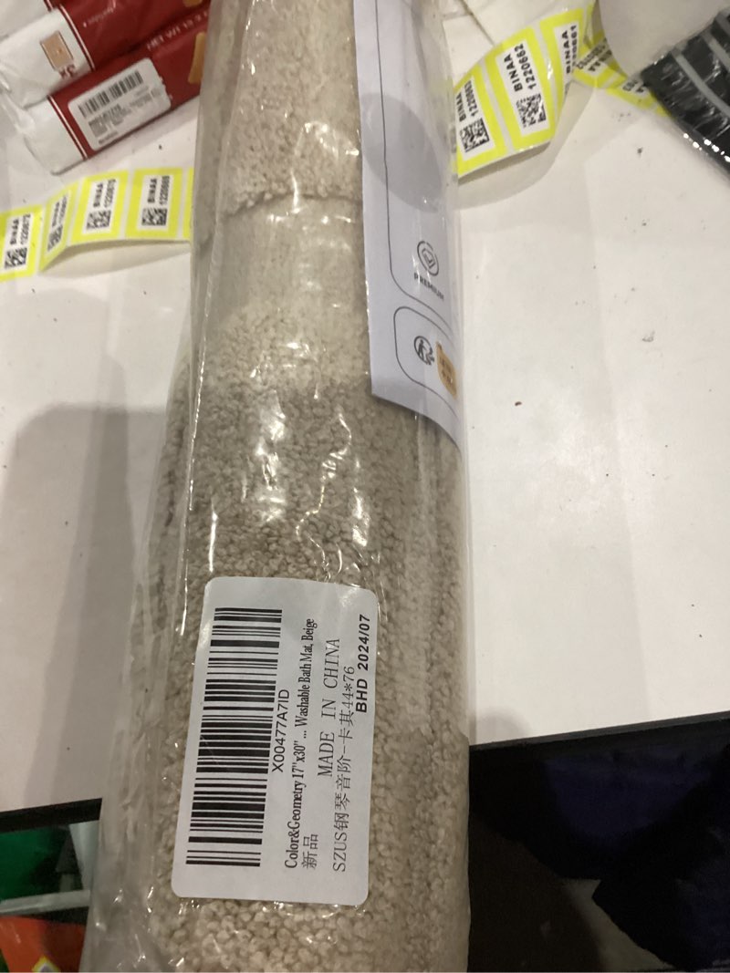 Condition photo showing New/Like New for Color&Geometry Khaki Bathroom Rug,Absorbent and Ultra Soft Plush Bath Mat for Bathroom,Non Slip Rugs with Rubber Backing, Quick Dry, Washable Shower Mat for Shower Floor,17"x30" Beige 17"x30"