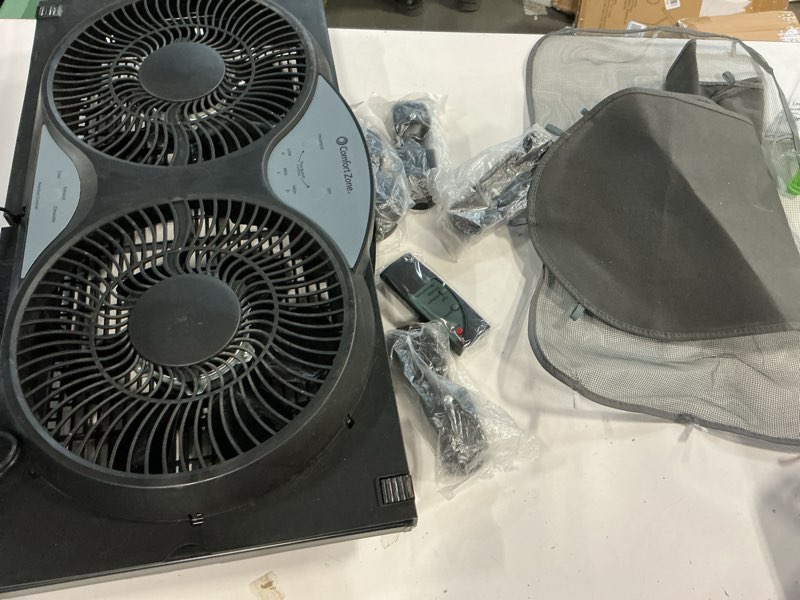 Condition photo showing Good Condition for Comfort Zone 9-Inch Reversible Twin Window Fan with Remote Control – 3-Speed Dual Blade Fan with Exhaust, Cooling & Circulate Modes, Expandable Width 23.5" to 37", Removable Bug Screen & Tabletop Feet Black 3-Speed w/Remote