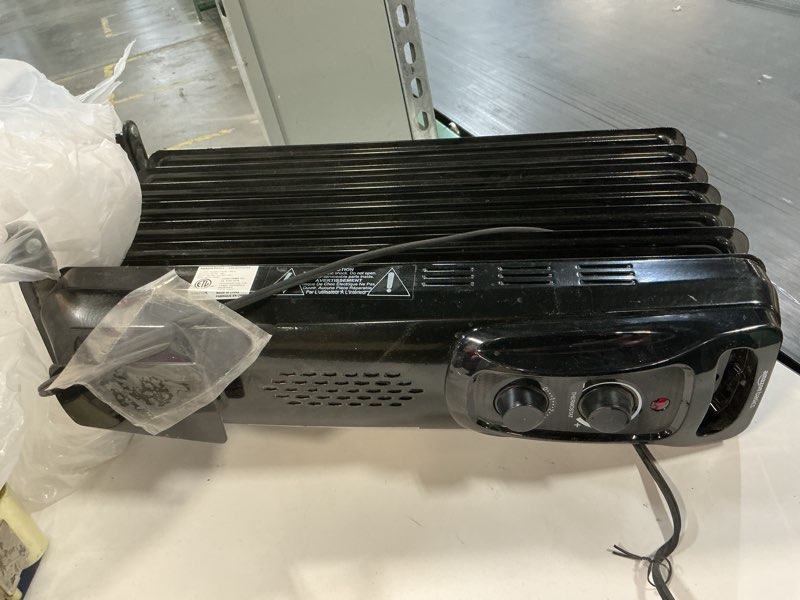 Condition photo showing As Is for Amazon Basics Portable Oil Radiator Heater for Indoor Use, 3 Heat Settings, Over-Heat Protection, ETL-certified Safety, 7 Oil-Filled Steel Fins, 1500W, 11"D x 14.8"W x 25.2"H, Black