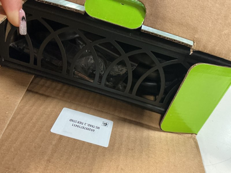 Condition photo showing As Is for mainstays black metal 2 tier shelves plant stand