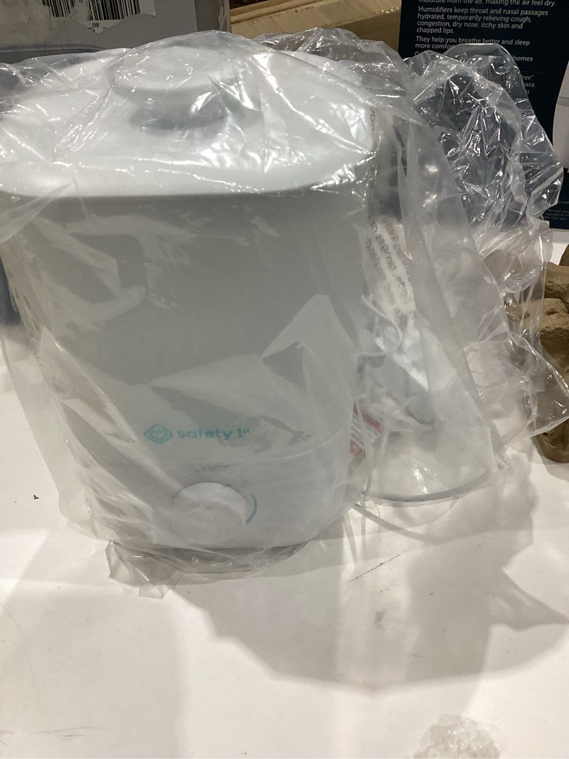 Condition photo showing As Is for easy-fill cool mist humidifier