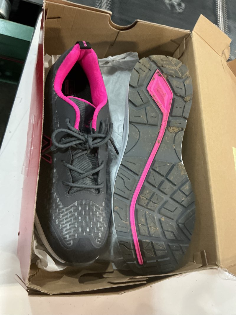 Condition photo showing As Is for new balance women's composite toe logic 12 wide grey/pink