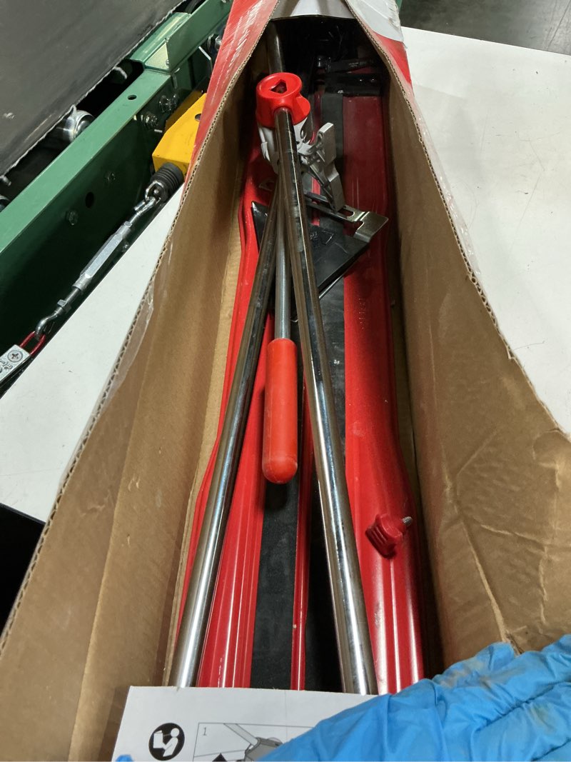 Condition photo showing As Is for rubi practic 61 plus-24 in. tile cutter with tungsten carbide blade and roller guide