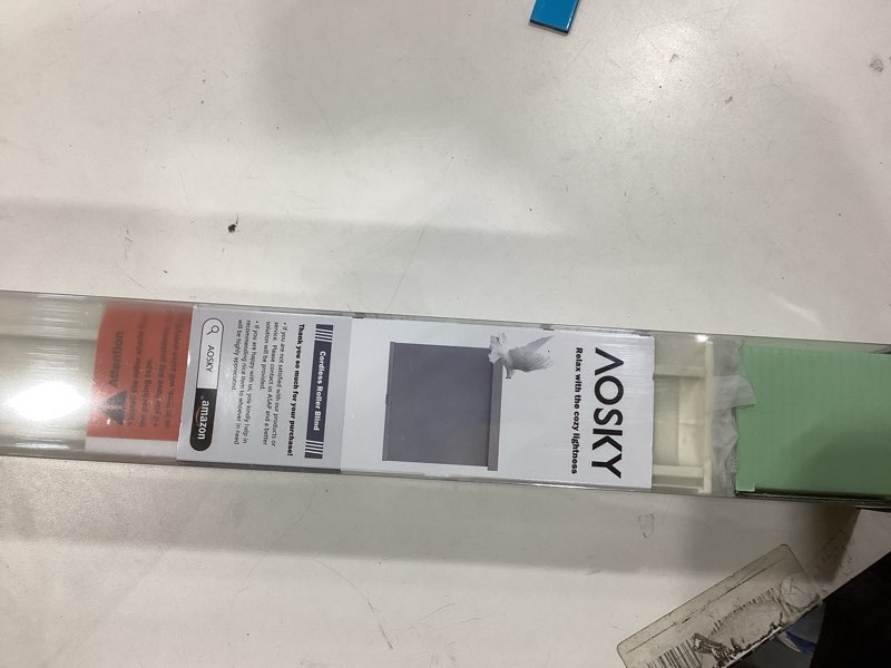 Condition photo showing Good Condition for AOSKY Blackout Roller Shades Cordless Blinds for Windows, Free-Stop Shades with Valance, Thermal Insulated Fabric, UV Protection, Natural Woven Blinds for Home and Office (31" W x 72" H, Ivory) Ivory 31"W x 72"H