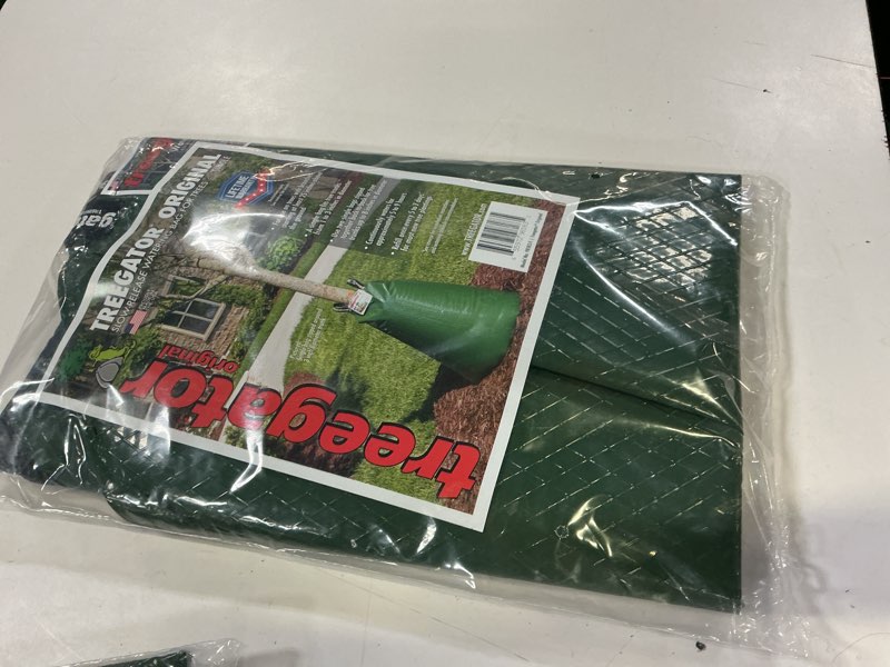 Condition photo showing New/Like New for treegator original slow release watering bag for trees, the original tree watering bag, ideal for new or established trees, fits trees from 1 to 8 inches in trunk diameter, made in usa, green 1 bag