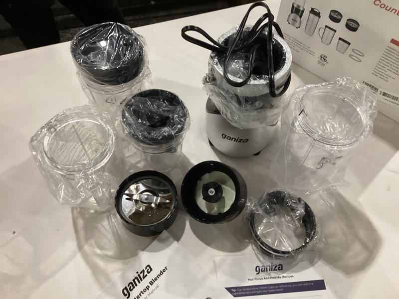 Condition photo showing Good Condition for Ganiza Smoothie Blender, 900W Blenders for Shakes and Smoothies, 15-Piece Personal Blender and Grinder Combo for Kitchen, Smoothies Maker with 4 BPA-Free Portable Cup, Nutritious Recipe Black