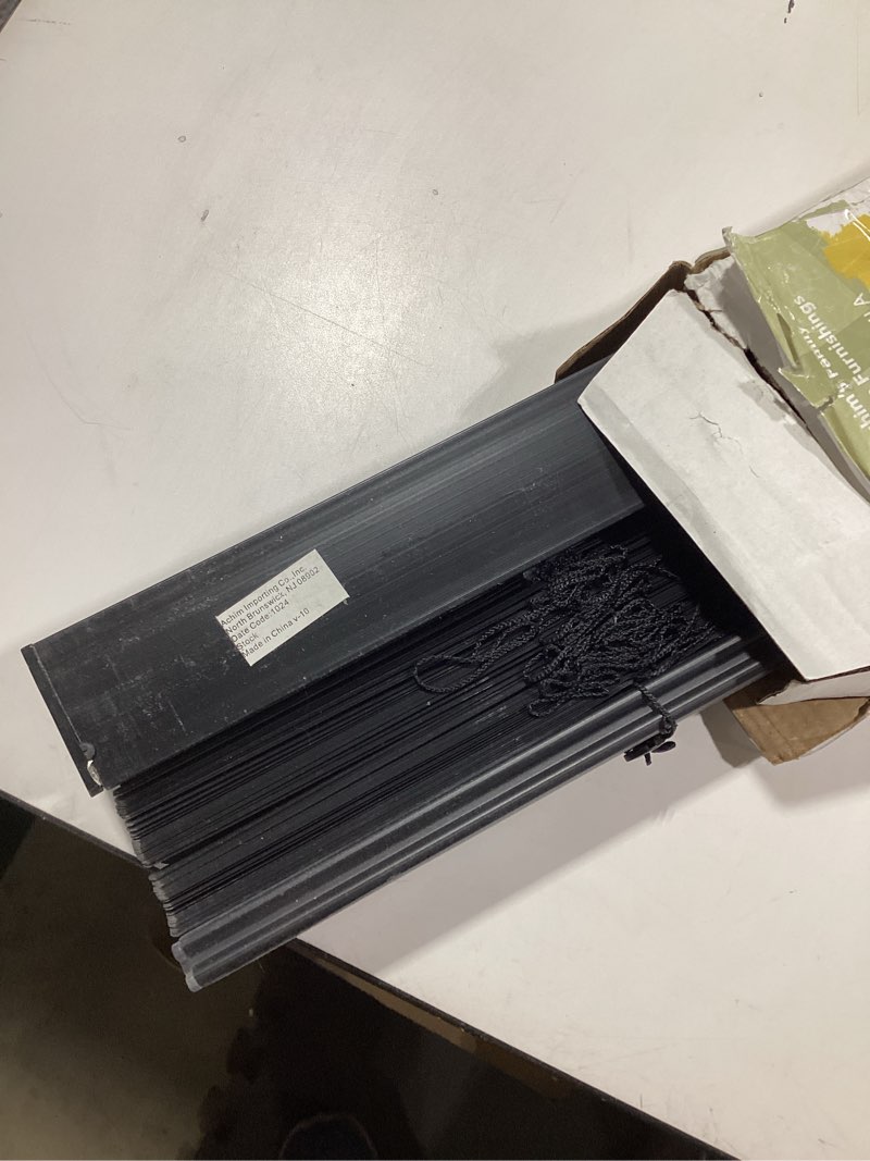 Condition photo showing As Is for achim gii morningstar indoor cordless black vinyl light filtering window mini blind  72  l x 34  w