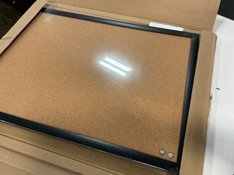 Condition photo showing Good Condition for u brands cork bulletin board, 17" x 23", black wood frame 17" x 23" black