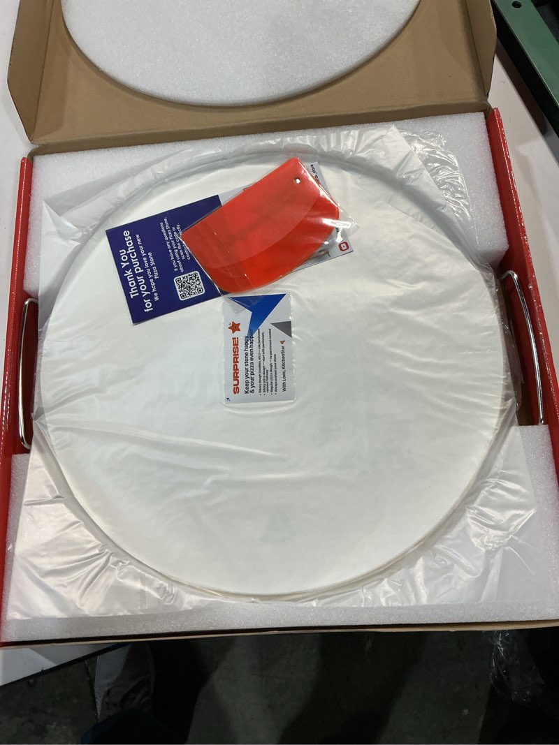 Condition photo showing New/Like New for KitchenStar 16-inch Pizza Stone for Oven and BBQ Grill with Handles, Round, 5/8" Thick - Natural Cordierite, 1800 °F Resistant, Baking Stone Set with Stainless Steel Rack & Plastic Scraper Tool 16 inch
