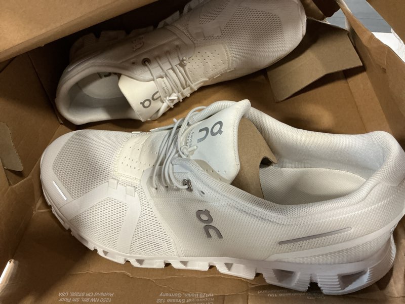 Condition photo showing As Is for on men's the roger advantage shoes 8 all white