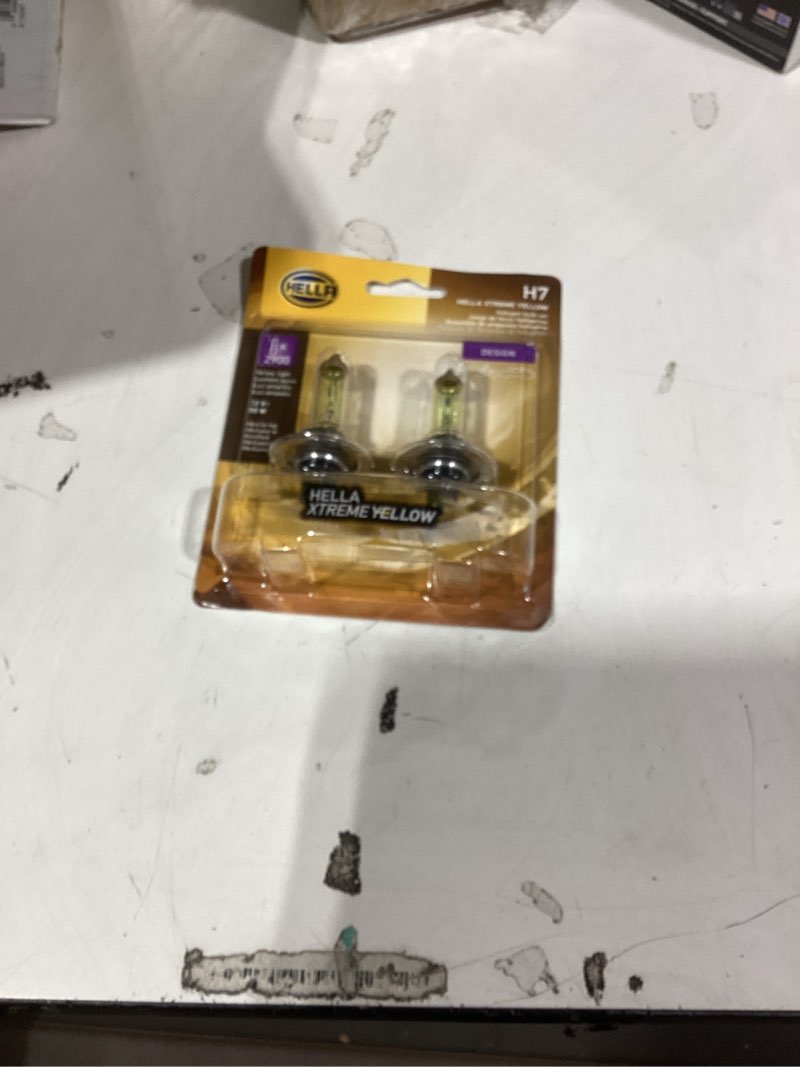 Condition photo showing New/Like New for hella h7 yl xtreme yellow bulb (12v 55w), 2 pack yellow - 55w twin blister