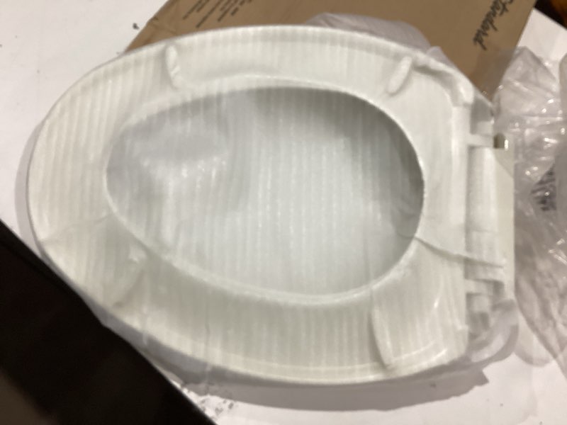Condition photo showing Good Condition for american standard 5257a65mt.222 cardiff slow-close elongated front toilet seat, linen linen modern