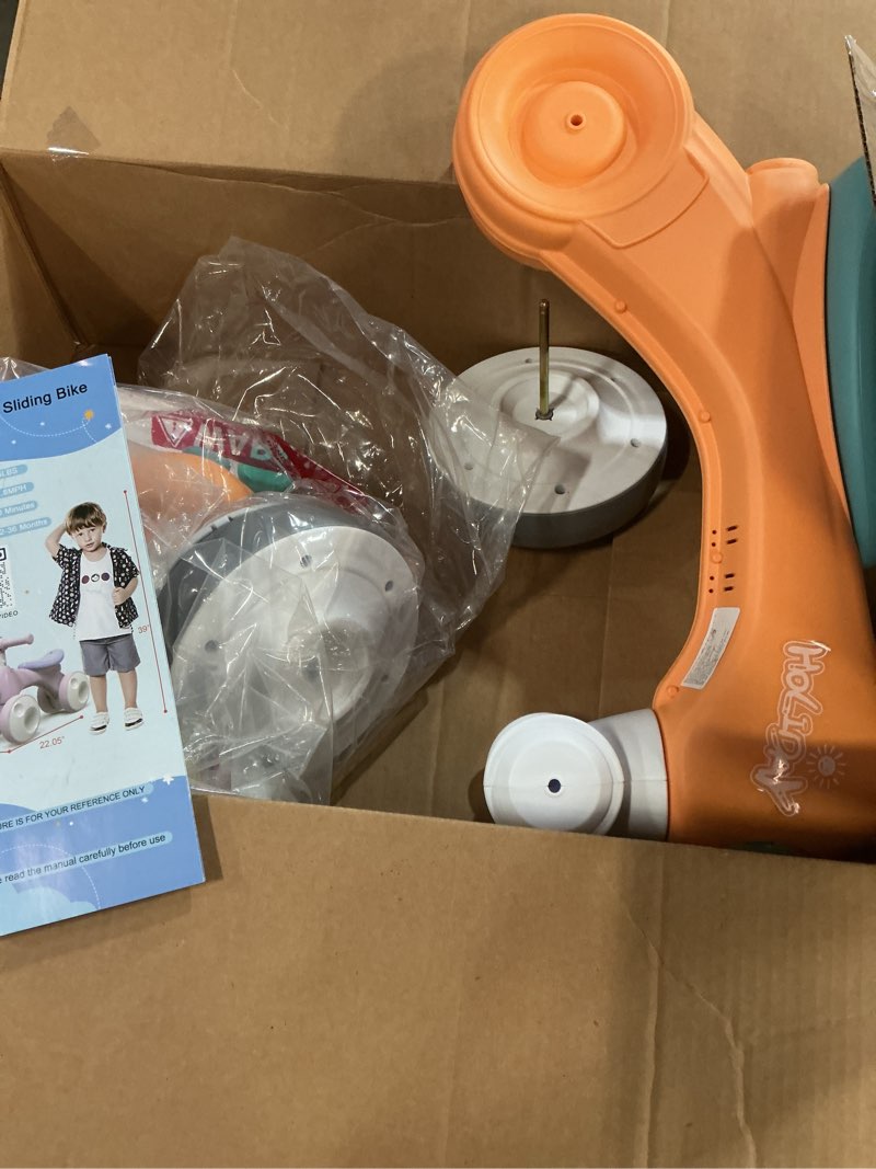 Condition photo showing As Is for Childrens sliding bike (color may vary)