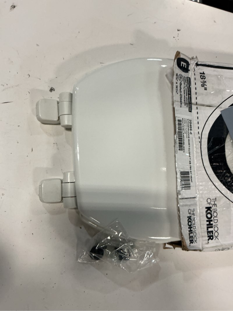 Condition photo showing Good Condition for kohler stonewood quiet-close elongated toilet seat, slow close design, durable wood, easy installation, universal fit, white finish, k-20466-0