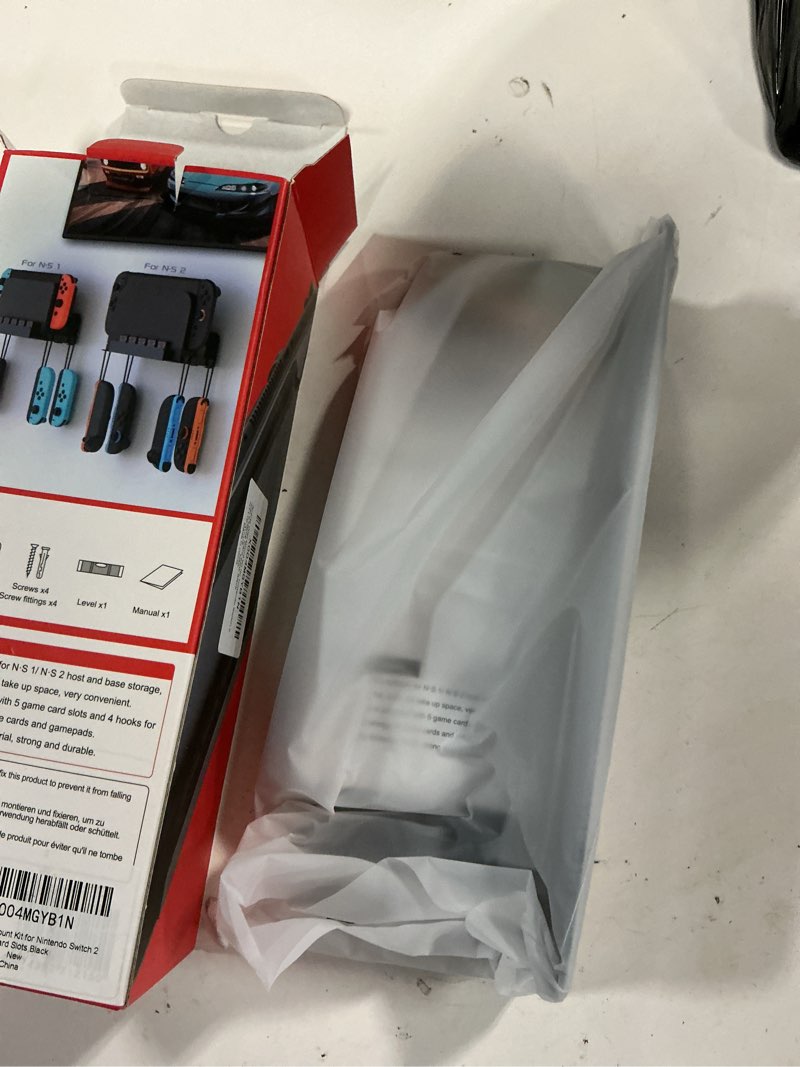 Condition photo showing New/Like New for auarte metal wall mount for nintendo switch 2 console | switch 2/1/oled compatible,accessories organizer shelf base kit behind tv with 5 card slots and 4 joypad hanger